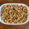 Finished Homemade Stuffing in white casserole dish.