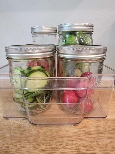 salad basket filled with chopped vegetables ready to add to salads