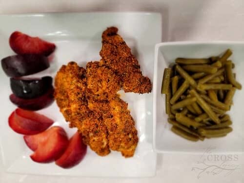chicken strips with fruit and vegetables