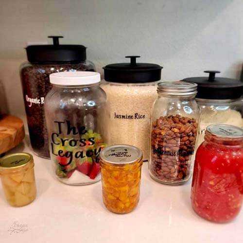 assorted glass jars of various sizes that contain different food ready to eat