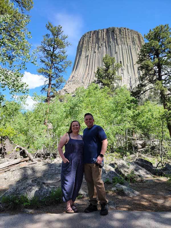amy-and-mike-cross-standing-in-front-of-Devils-Tower