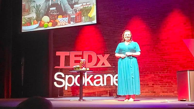 Amy on the TEDx Stage on October 8, 2022 in Spokane, WA