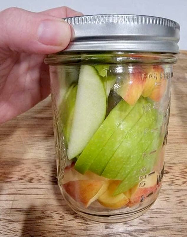 pre-sliced apples in a mason jar for healthy snacks