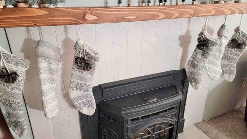Christmas stockings hung by the fireplace.