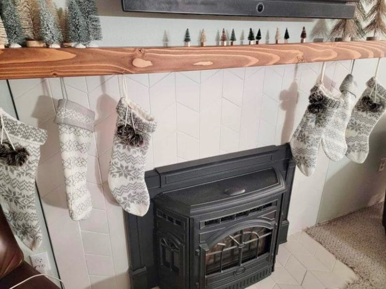 Christmas stockings hung by the fireplace.