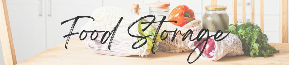 Fresh produce in reusable bags on a wooden kitchen table. Food Storage Category Page Header Graphic.