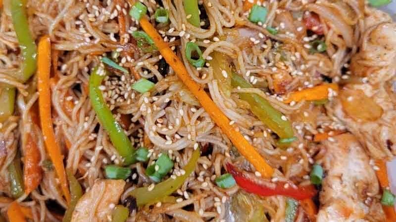 Finished Yakisoba Recipe using gluten free noodles, chicken, peppers, carrots, and onions.